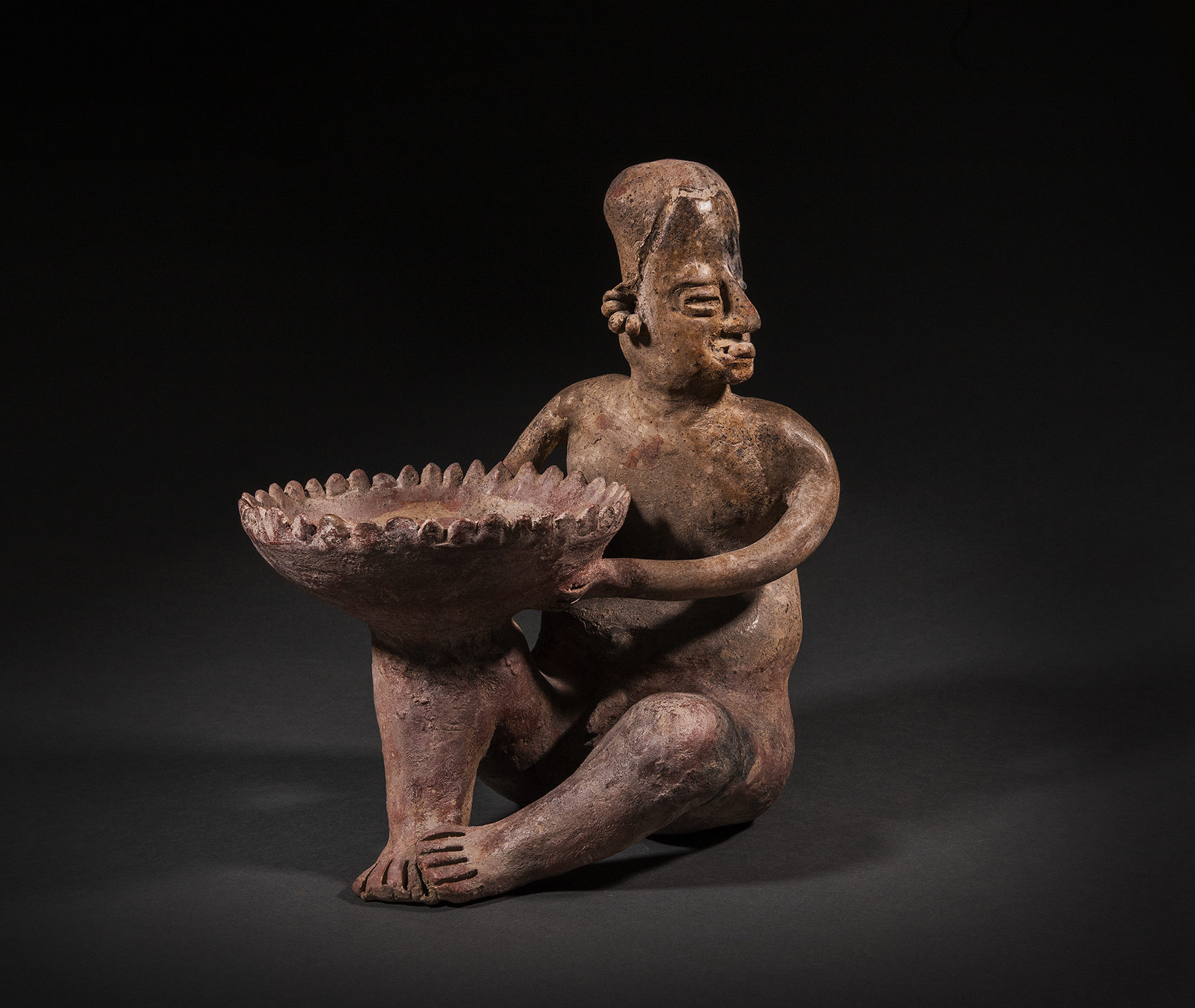 Jalisco male seated figure holding flared bowl 7