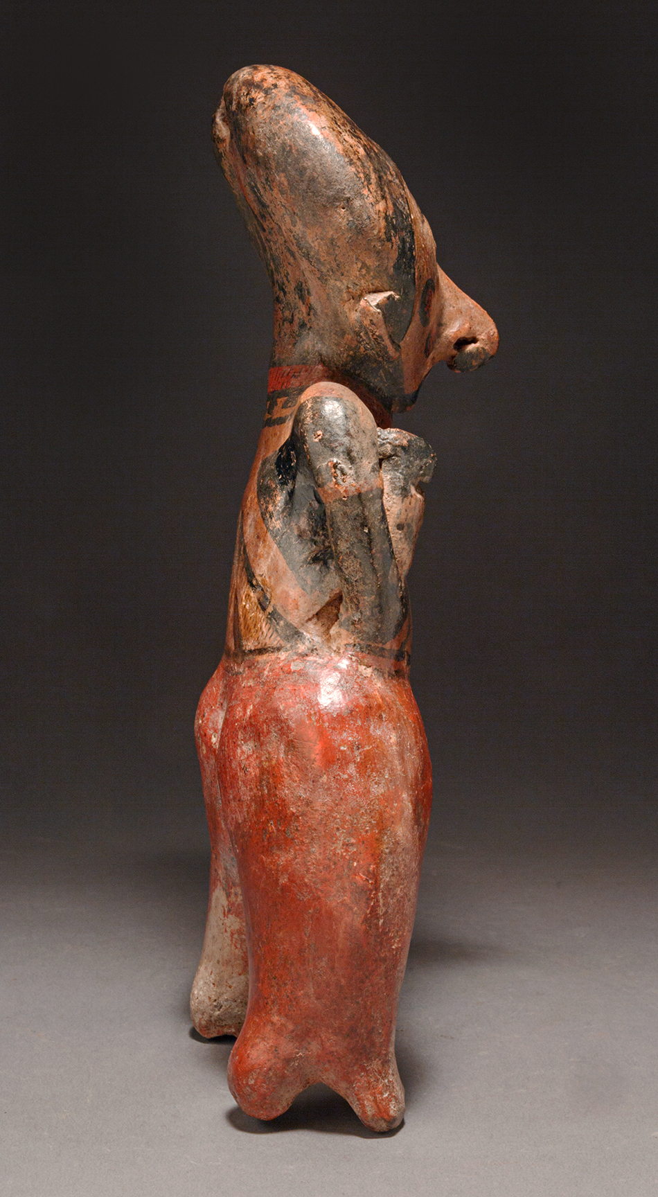 Chinesco standing female holding a baby 7