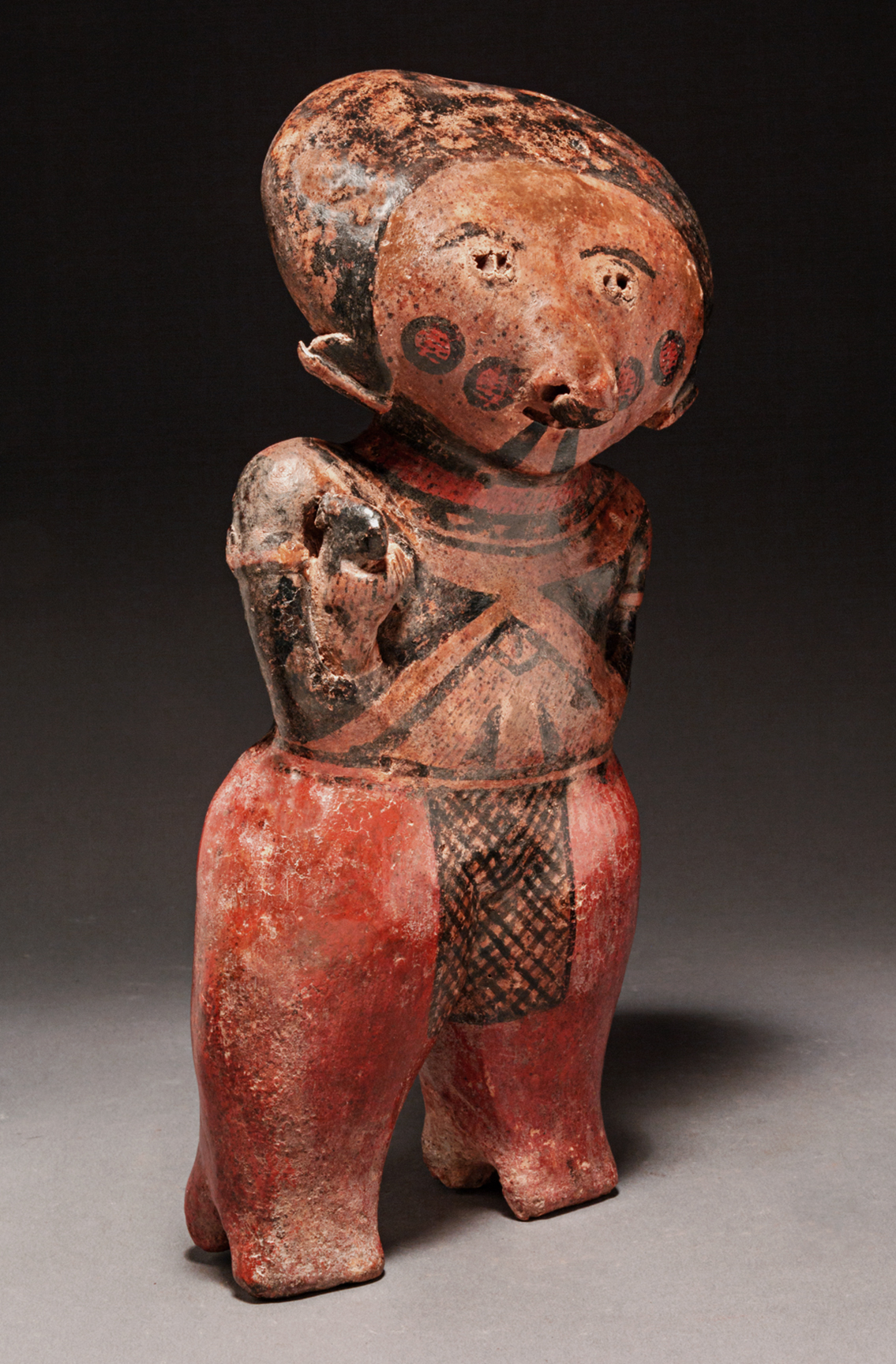 Chinesco standing female holding a baby 8